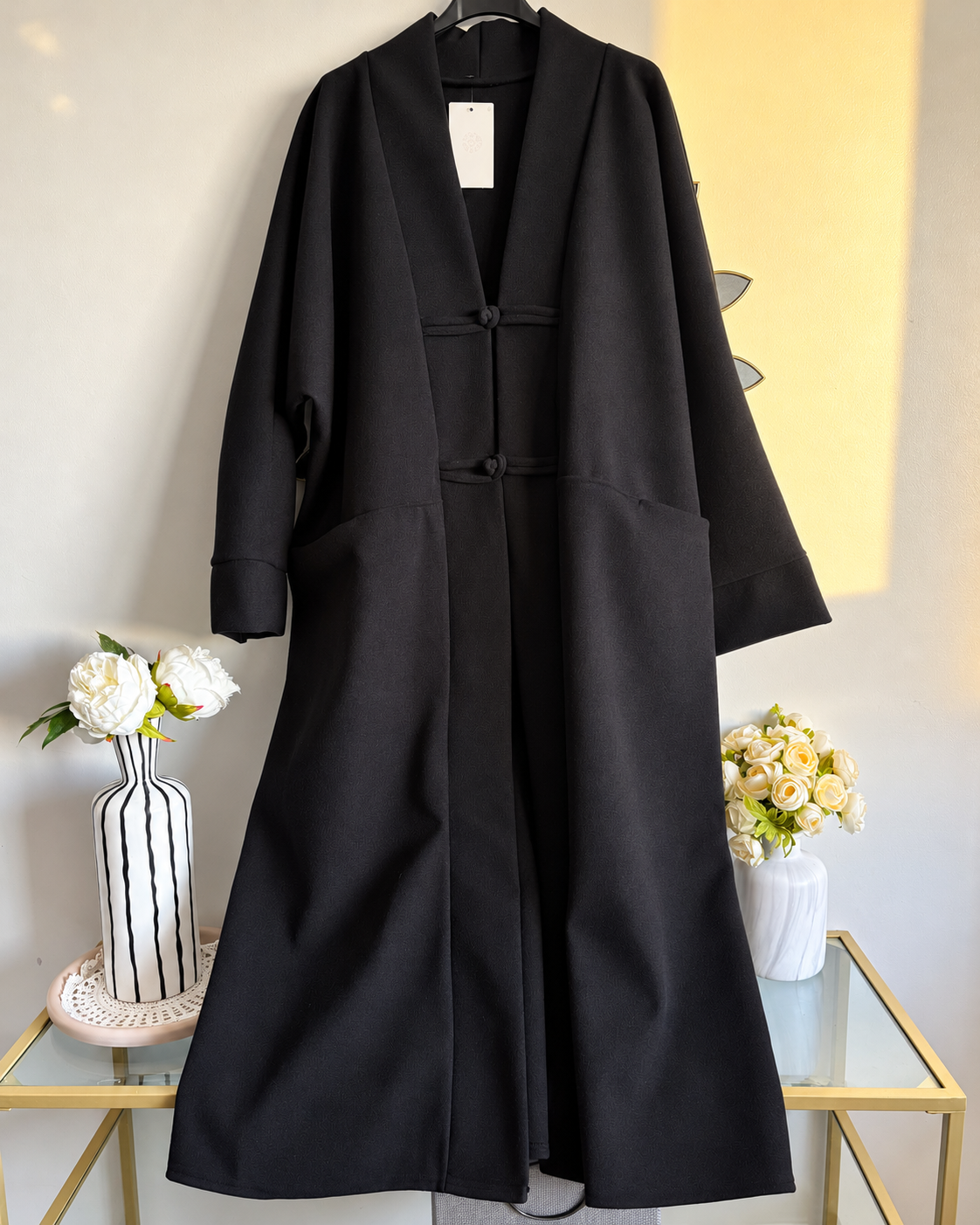 Manteau long oversize à brandebourgs