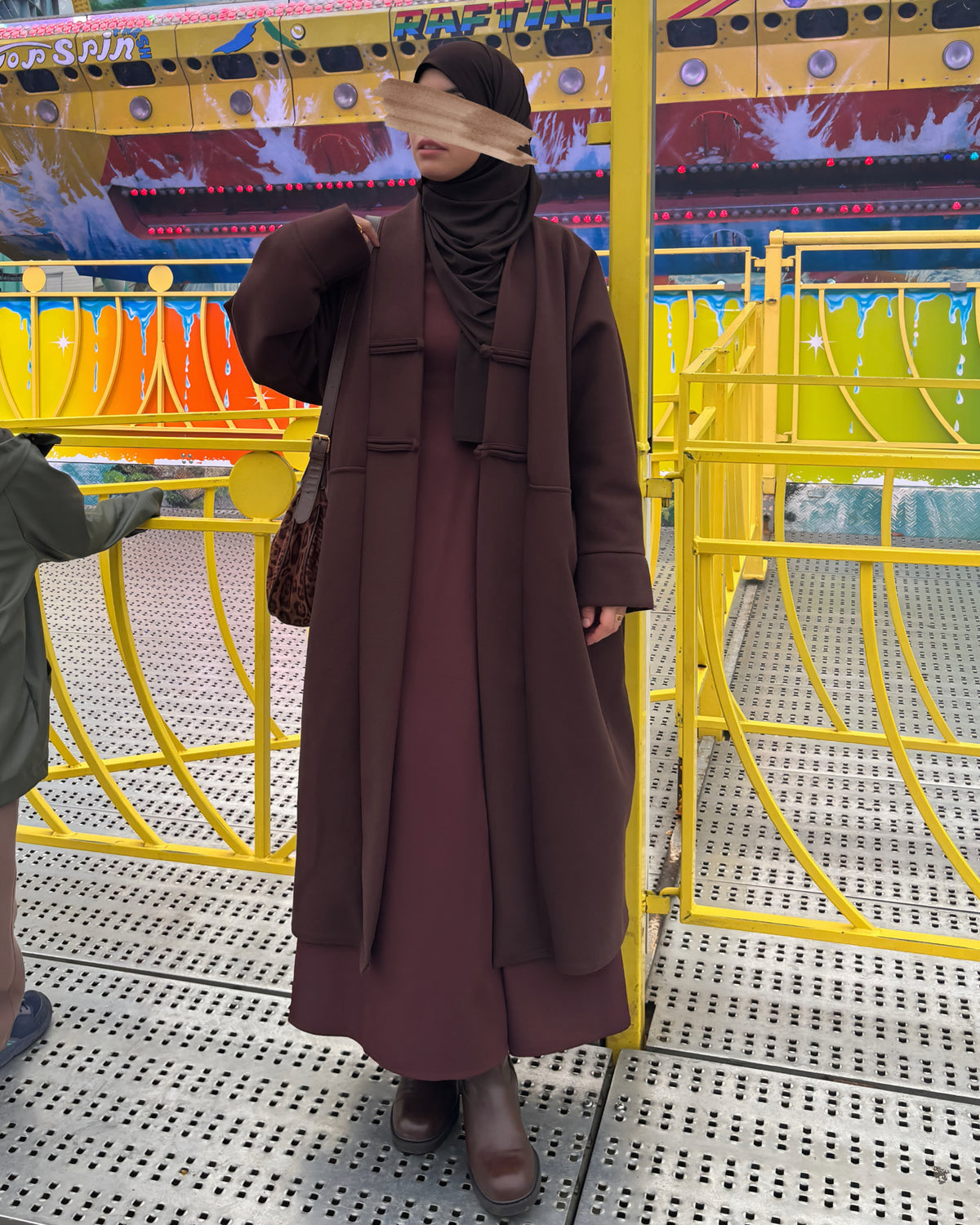 Manteau long oversize à brandebourgs