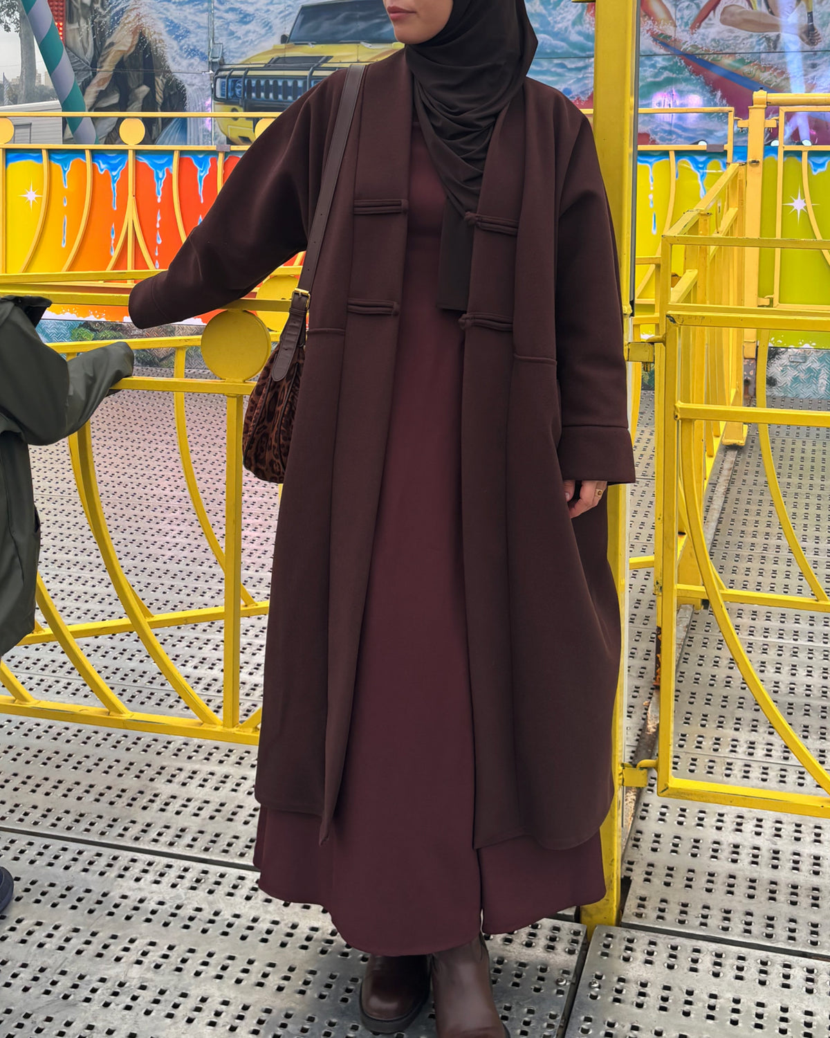 Manteau long oversize à brandebourgs