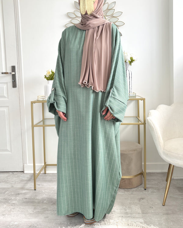 Abaya rayée Dana en tissu rayé – modest fashion femme musulmane

